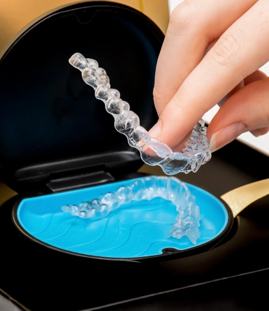 Invisalign aligners close-up at Cloud Dental Austin